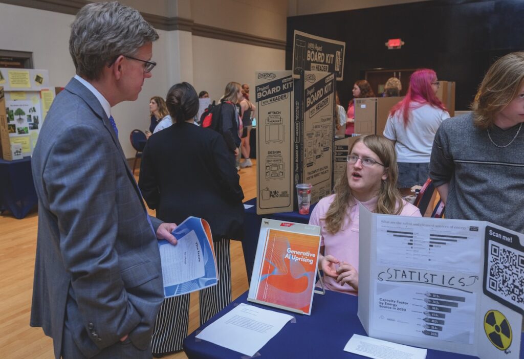 Students with English Professor Steve Severn at the Celebration of Student Writing (MTSU photo by Andy Heidt)