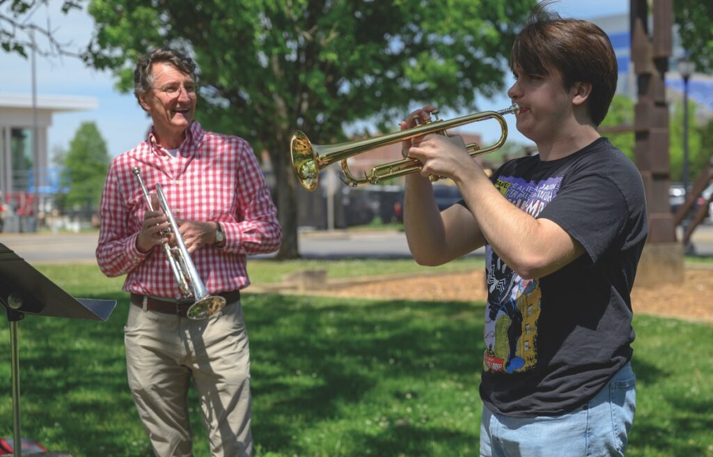 Music student Aiden Taylor (r) working with Jamey Simmons, a jazz trumpet professor (MTSU photo by J. Intintoli)
