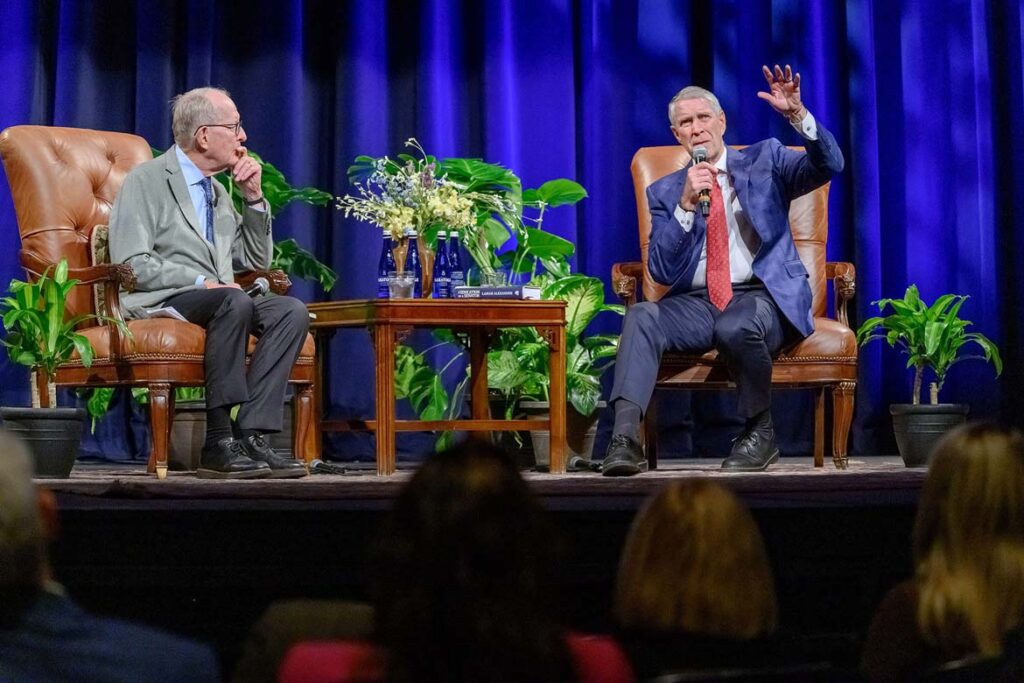 Former U.S. Sens. Lamar Alexander, at left, and Dr. Bill Frist talk on the topic of “Leadership and Public Service” during a conversational lecture held inside Tucker Theatre on the campus of Middle Tennessee State University in Murfreesboro, Tenn., on Monday, Oct. 19, presented by the MTSU American Democracy Project as part of the America 250 celebrations happening throughout the year to celebrate the United States semiquincentennial. (MTSU photo by J. Intintoli)