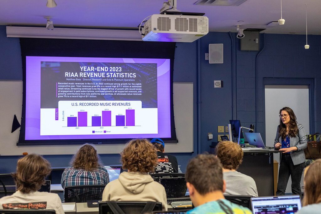 In this file image, Holly Riley, assistant professor of recording industry at Middle Tennessee State University in Murfreesboro, Tenn., teaches a class inside the Bragg Media and Entertainment Building. MTSU Department of Recording Industry has been named among Billboard’s top music business schools for the 12th consecutive year. (MTSU file photo)