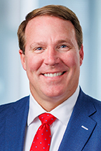 Brian Kidd, senior VP at NHC, smiling.