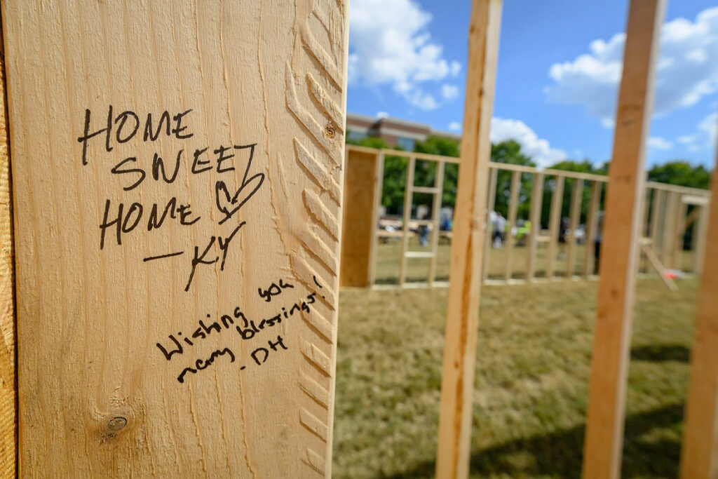 Middle Tennessee State University student volunteers left heartfelt messages in permanent ink on the frame of Cle-etta Jefferson’s Habitat house. The annual panel build on Thursday, Oct. 1, 2026, offered students the opportunity to help build a house alongside seasoned volunteers without ever leaving the Murfreesboro, Tenn., campus. (MTSU photo by J. Intintoli)
