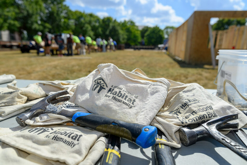 At Habitat for Humanity’s panel build job site on the Student Union Commons at Middle Tennessee State University in Murfreesboro, Tenn., a table of hammers, work aprons and other construction equipment greets student volunteers. The annual panel build on Thursday, Oct. 1, 2026, offered students the opportunity to help build a house alongside seasoned volunteers without ever leaving campus. (MTSU photo by J. Intintoli)