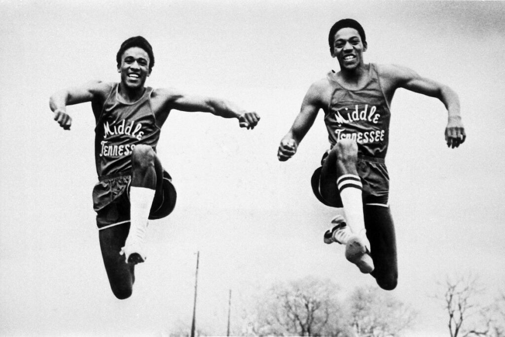 Two of the NCAA national champions coached by Hayes: triple jumpers Tommy Haynes (l) and Barry McClure