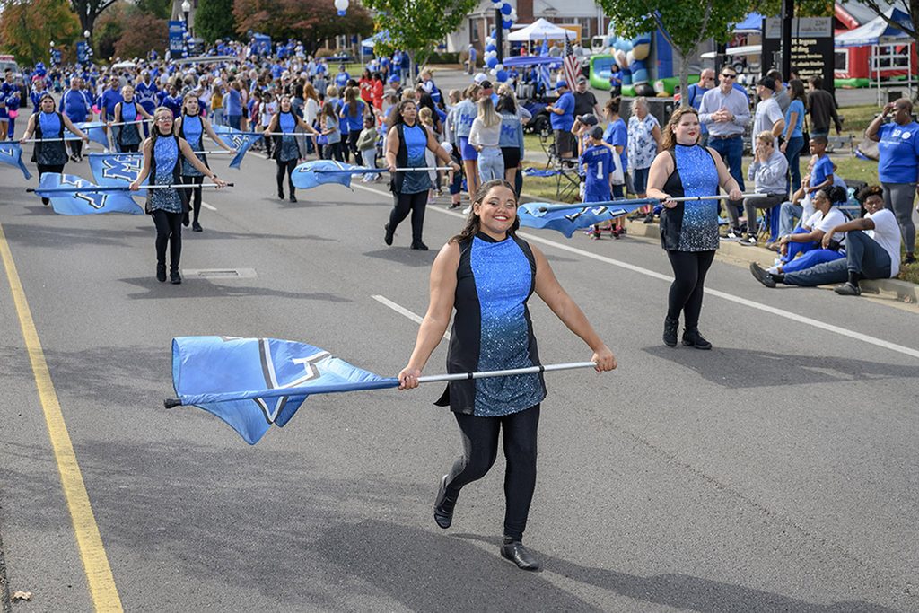 Middle Tennessee State University’s color guard marches past the Alumni House during a previous year’s Homecoming parade. The 2026 Homecoming parade starts at 10 a.m. on Saturday, Nov. 7, on East Main Street at Maney Avenue in Murfreesboro, Tenn., before turning left onto Middle Tennessee Boulevard and ending before Greenland Drive. (MTSU file photo by J. Intintoli)