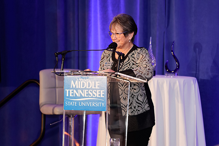 Joyce Heames, dean of the Jennings A. Jones College of Business at Middle Tennessee State University in Murfreesboro, Tenn., welcomes attendees to the college’s 2026 Leadership Awards ceremony held Thursday, Oct. 1, 2026, at Stones River Country Club in Murfreesboro, Tenn. (MTSU photo by Carl Edmondson).