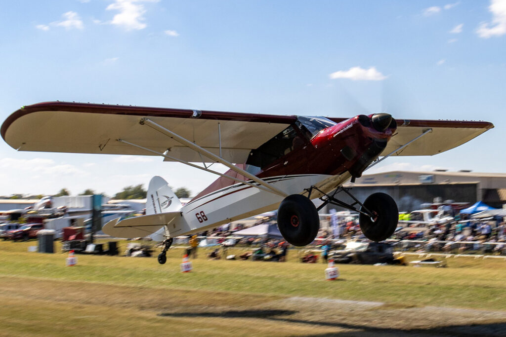 A Carbon Cub aircraft settles onto the grass at Music City STOL 2025 in Gallatin, Tenn. This year’s event is set for Oct. 9-10, 2026, at Lebanon Municipal Airport. (Photo courtesy of Art Rubin / Music City STOL).