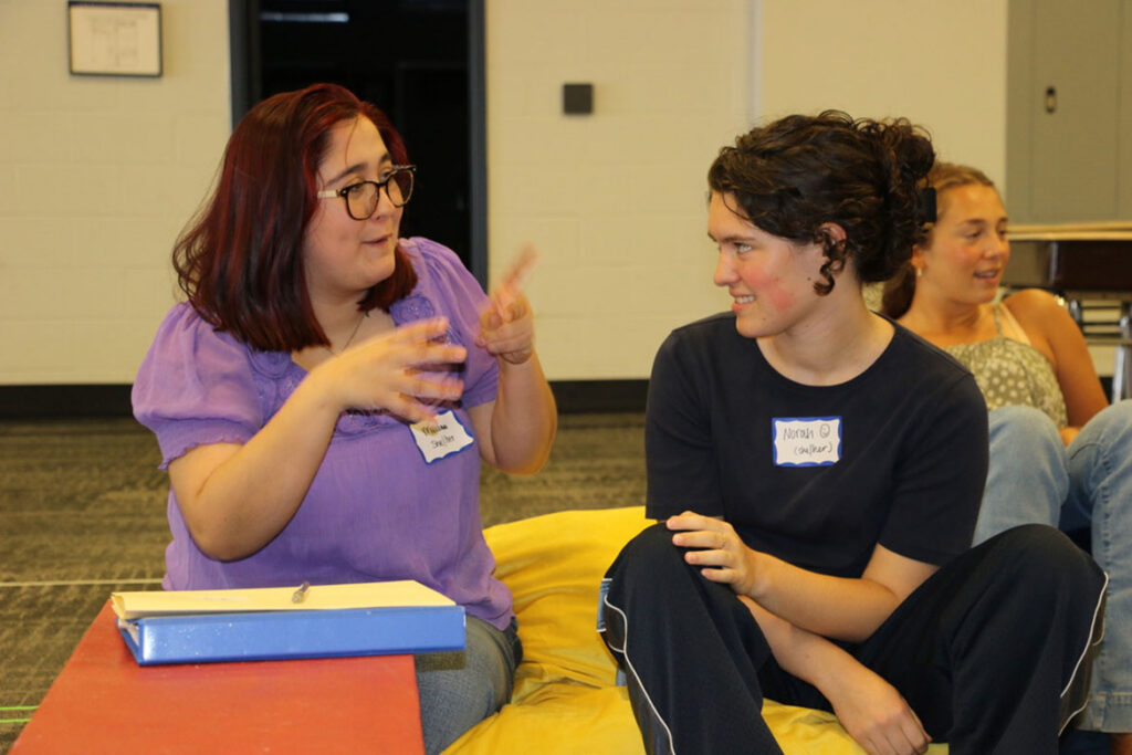 Middle Tennessee State University theatre alumna Melana Harris, left, gives direction to MTSU student Norah Younger during rehearsals for “John Proctor is the Villain” at the Nashville Repertory Theatre. Harris is the apprentice director, and Younger plays the role of Shelby Holcomb in the production, which runs through Oct. 18, 2026, at the Tennessee Performing Arts Center’s Johnson Theater in Nashville, Tenn. (Photo by Chad Driver)